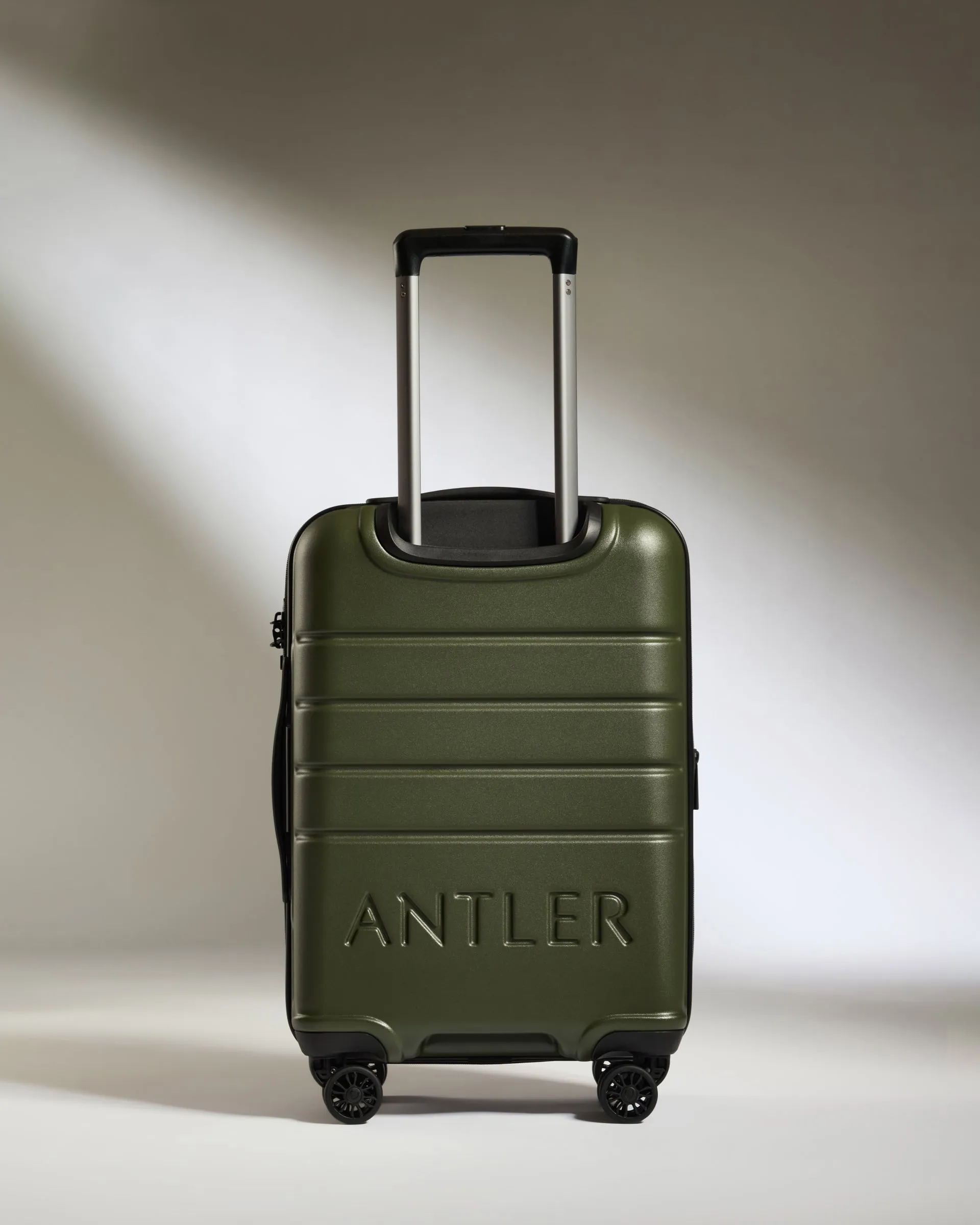 Expandable Carry-on Luggage in Pine - Logo