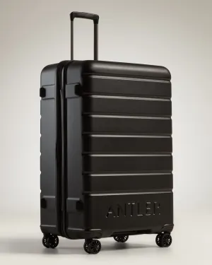 Large Luggage in Black - Logo