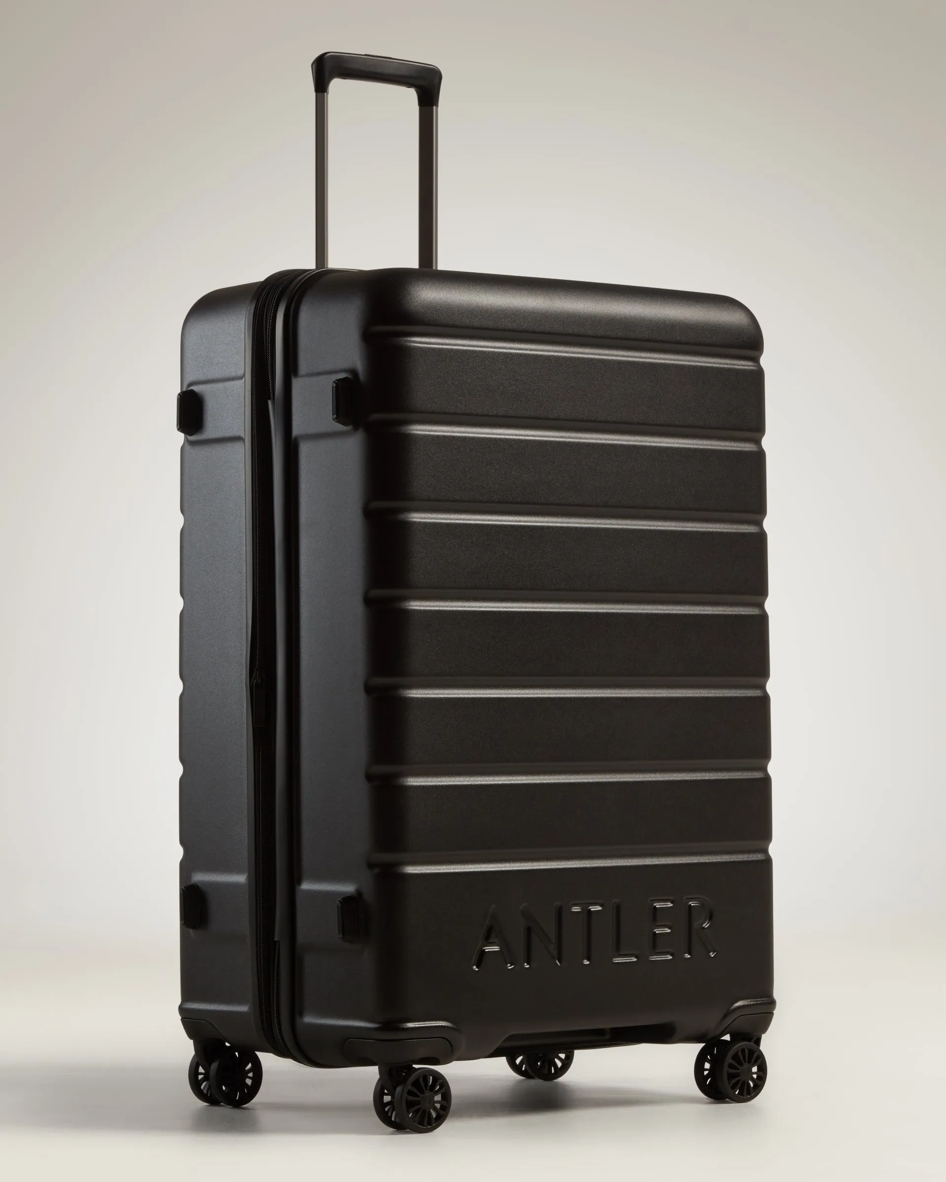 Large Luggage in Black - Logo