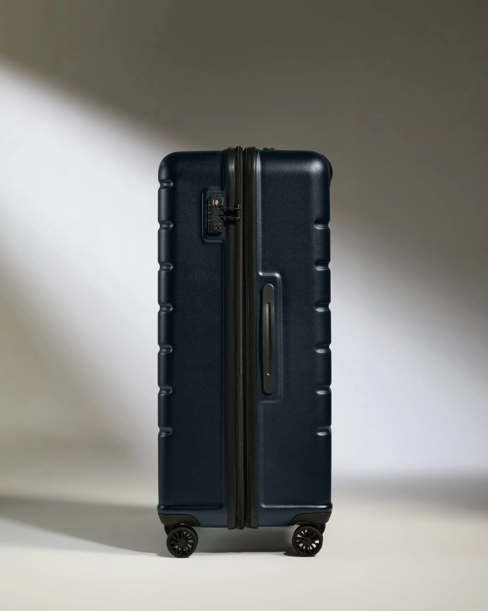 Large Luggage in Dark Navy - Logo