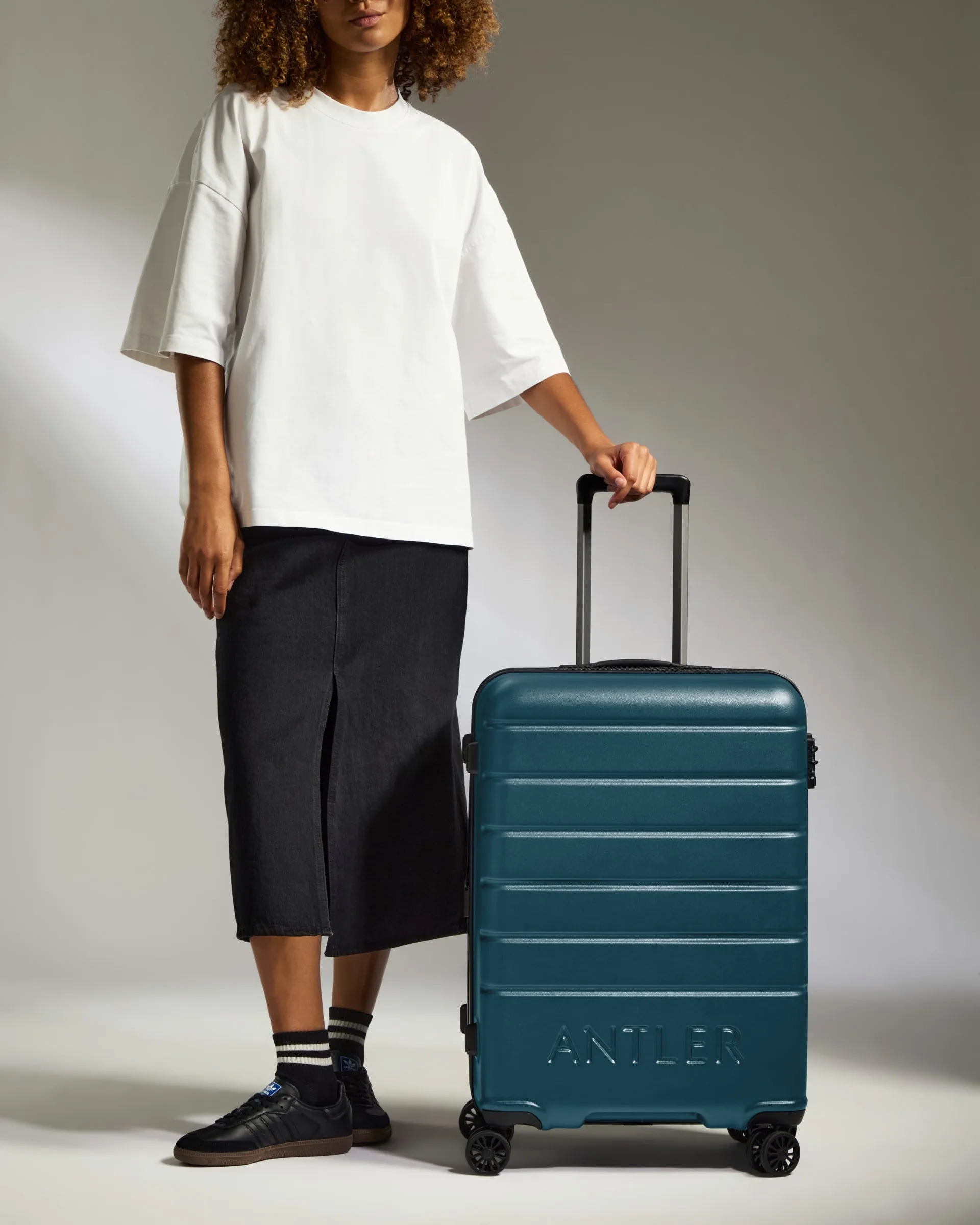Medium Luggage in Soft Blue - Logo